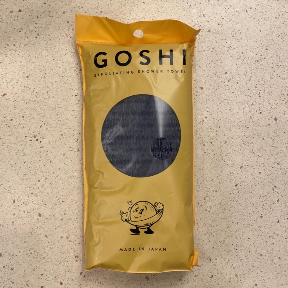 New! Unopened! Goshi exfoliating shower towel.